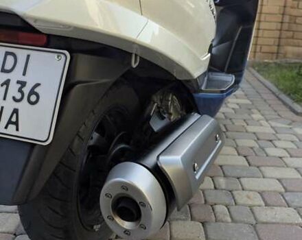 Белый Сузуки Skywave 250, объемом двигателя 0.25 л и пробегом 43 тыс. км за 2700 $, фото 27 на Automoto.ua