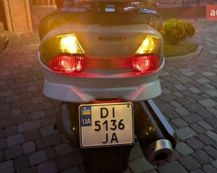 Белый Сузуки Skywave 250, объемом двигателя 0.25 л и пробегом 43 тыс. км за 2700 $, фото 1 на Automoto.ua