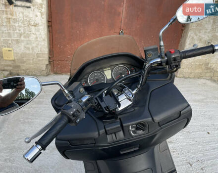 Черный Сузуки Skywave 250, объемом двигателя 0 л и пробегом 23 тыс. км за 1900 $, фото 9 на Automoto.ua