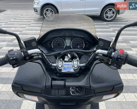 Черный Сузуки Skywave 250, объемом двигателя 0.25 л и пробегом 27 тыс. км за 2649 $, фото 10 на Automoto.ua