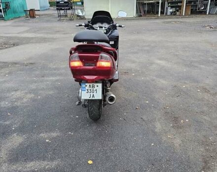 Красный Сузуки Skywave 250, объемом двигателя 0.25 л и пробегом 29 тыс. км за 1800 $, фото 2 на Automoto.ua