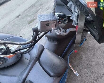 Синий Сузуки Skywave 250, объемом двигателя 0.25 л и пробегом 42 тыс. км за 1700 $, фото 6 на Automoto.ua