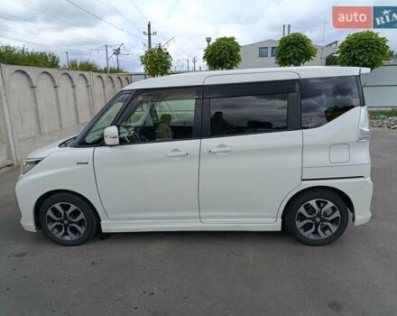 Белый Сузуки SOLIO, объемом двигателя 1.24 л и пробегом 43 тыс. км за 11000 $, фото 4 на Automoto.ua