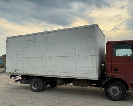 Красный TATA LPT 613, объемом двигателя 5.68 л и пробегом 251 тыс. км за 5500 $, фото 2 на Automoto.ua