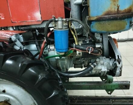 Красный ТЗ 4k-14, объемом двигателя 2 л и пробегом 100 тыс. км за 4000 $, фото 5 на Automoto.ua