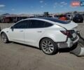 Белый Тесла Модель 3, объемом двигателя 0 л и пробегом 106 тыс. км за 2900 $, фото 1 на Automoto.ua