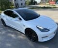 Белый Тесла Модель 3, объемом двигателя 0 л и пробегом 57 тыс. км за 21000 $, фото 1 на Automoto.ua