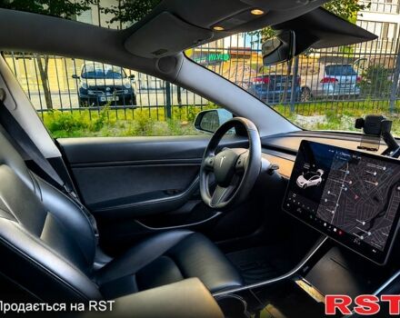 Білий Тесла Модель 3, об'ємом двигуна 0.32 л та пробігом 191 тис. км за 15400 $, фото 4 на Automoto.ua