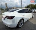 Білий Тесла Модель 3, об'ємом двигуна 0 л та пробігом 233 тис. км за 11600 $, фото 1 на Automoto.ua