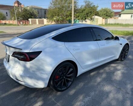 Белый Тесла Модель 3, объемом двигателя 0 л и пробегом 57 тыс. км за 21000 $, фото 68 на Automoto.ua