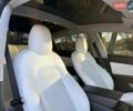 Белый Тесла Модель 3, объемом двигателя 0 л и пробегом 99 тыс. км за 19900 $, фото 26 на Automoto.ua