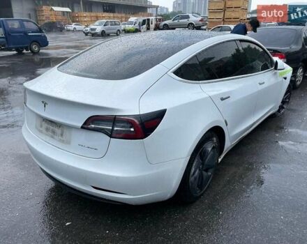 Белый Тесла Модель 3, объемом двигателя 0 л и пробегом 73 тыс. км за 12494 $, фото 3 на Automoto.ua