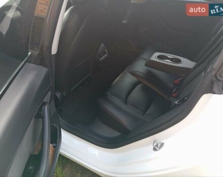 Белый Тесла Модель 3, объемом двигателя 0 л и пробегом 128 тыс. км за 16000 $, фото 1 на Automoto.ua