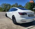 Белый Тесла Модель 3, объемом двигателя 0 л и пробегом 90 тыс. км за 16000 $, фото 2 на Automoto.ua