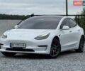 Белый Тесла Модель 3, объемом двигателя 0 л и пробегом 125 тыс. км за 15000 $, фото 1 на Automoto.ua