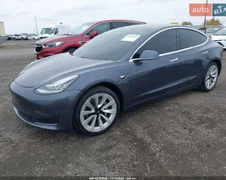 Білий Тесла Модель 3, об'ємом двигуна 0 л та пробігом 100 тис. км за 6000 $, фото 1 на Automoto.ua