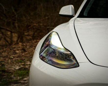 Белый Тесла Модель 3, объемом двигателя 0 л и пробегом 76 тыс. км за 20000 $, фото 7 на Automoto.ua