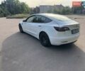Белый Тесла Модель 3, объемом двигателя 0 л и пробегом 75 тыс. км за 23000 $, фото 1 на Automoto.ua