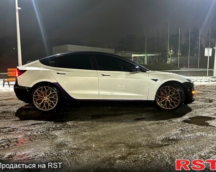 Білий Тесла Модель 3, об'ємом двигуна 0 л та пробігом 74 тис. км за 23500 $, фото 2 на Automoto.ua