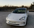 Белый Тесла Модель 3, объемом двигателя 0 л и пробегом 77 тыс. км за 25000 $, фото 1 на Automoto.ua