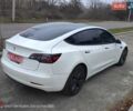 Білий Тесла Модель 3, об'ємом двигуна 0 л та пробігом 74 тис. км за 17900 $, фото 2 на Automoto.ua