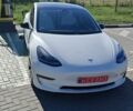 Білий Тесла Модель 3, об'ємом двигуна 0 л та пробігом 77 тис. км за 22100 $, фото 1 на Automoto.ua