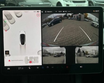 Білий Тесла Модель 3, об'ємом двигуна 0 л та пробігом 61 тис. км за 26999 $, фото 10 на Automoto.ua