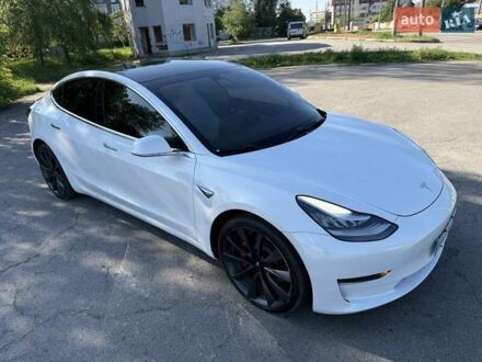 Белый Тесла Модель 3, объемом двигателя 0 л и пробегом 57 тыс. км за 21000 $, фото 1 на Automoto.ua