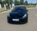 Черный Тесла Модель 3, объемом двигателя 0 л и пробегом 142 тыс. км за 16000 $, фото 1 на Automoto.ua