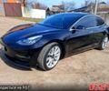 Чорний Тесла Модель 3, об'ємом двигуна 75 л та пробігом 141 тис. км за 18500 $, фото 1 на Automoto.ua