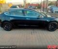 Чорний Тесла Модель 3, об'ємом двигуна 0.32 л та пробігом 57 тис. км за 17800 $, фото 1 на Automoto.ua