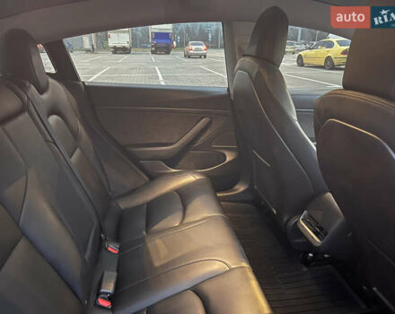 Черный Тесла Модель 3, объемом двигателя 0 л и пробегом 77 тыс. км за 20000 $, фото 79 на Automoto.ua