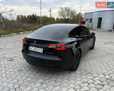 Тесла Модель 3 2021 у Ковель на Automoto.ua Чорний Тесла Модель 3, об'ємом двигуна 0 л та пробігом 63 тис. км за 22500 $, фото 6 на Automoto.ua