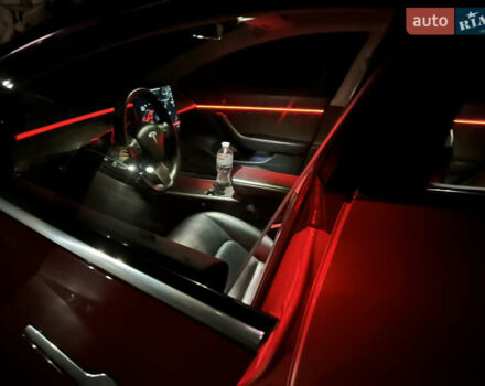 Красный Тесла Модель 3, объемом двигателя 0 л и пробегом 129 тыс. км за 20999 $, фото 35 на Automoto.ua