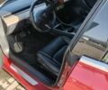 Червоний Тесла Модель 3, об'ємом двигуна 0 л та пробігом 104 тис. км за 15700 $, фото 1 на Automoto.ua