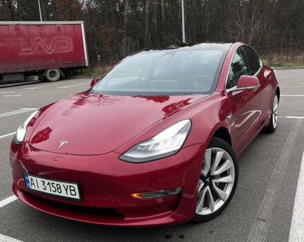 Красный Тесла Модель 3, объемом двигателя 0 л и пробегом 77 тыс. км за 17000 $, фото 1 на Automoto.ua