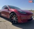 Красный Тесла Модель 3, объемом двигателя 0 л и пробегом 130 тыс. км за 17000 $, фото 1 на Automoto.ua