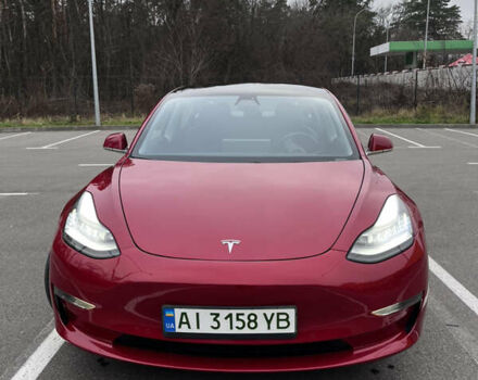 Красный Тесла Модель 3, объемом двигателя 0 л и пробегом 77 тыс. км за 17000 $, фото 2 на Automoto.ua