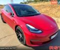 Красный Тесла Модель 3, объемом двигателя 0.52 л и пробегом 130 тыс. км за 16500 $, фото 1 на Automoto.ua
