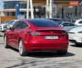 Красный Тесла Модель 3, объемом двигателя 0 л и пробегом 140 тыс. км за 17300 $, фото 1 на Automoto.ua