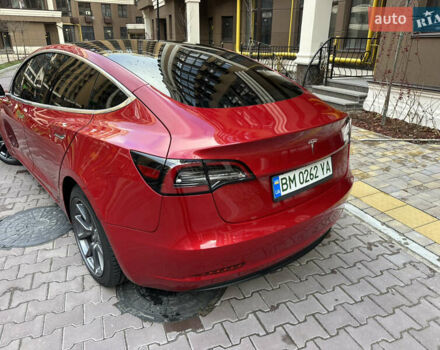 Красный Тесла Модель 3, объемом двигателя 0 л и пробегом 102 тыс. км за 19100 $, фото 1 на Automoto.ua