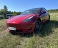 Красный Тесла Модель 3, объемом двигателя 0 л и пробегом 121 тыс. км за 19671 $, фото 1 на Automoto.ua