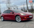 Красный Тесла Модель 3, объемом двигателя 0 л и пробегом 107 тыс. км за 16400 $, фото 1 на Automoto.ua