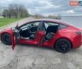 Красный Тесла Модель 3, объемом двигателя 0 л и пробегом 115 тыс. км за 19999 $, фото 4 на Automoto.ua