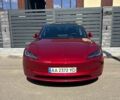 Красный Тесла Модель 3, объемом двигателя 0 л и пробегом 32 тыс. км за 32000 $, фото 1 на Automoto.ua