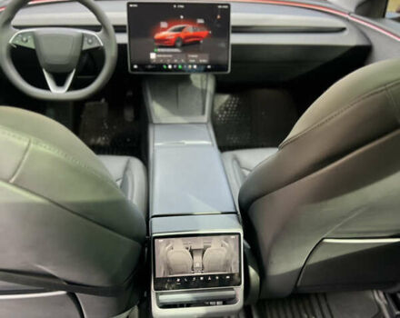 Тесла Модель 3 2024 у Харкові на Automoto.ua Червоний Тесла Модель 3, об'ємом двигуна 0 л та пробігом 14 тис. км за 24799 $, фото 9 на Automoto.ua