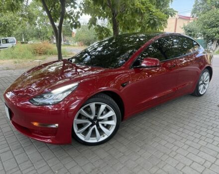 Красный Тесла Модель 3, объемом двигателя 0 л и пробегом 139 тыс. км за 17006 $, фото 1 на Automoto.ua