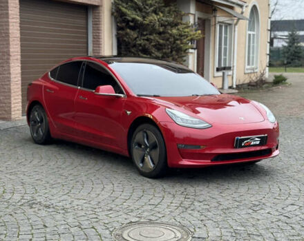 Красный Тесла Модель 3, объемом двигателя 0 л и пробегом 125 тыс. км за 17999 $, фото 1 на Automoto.ua