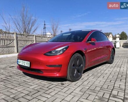 Красный Тесла Модель 3, объемом двигателя 0 л и пробегом 69 тыс. км за 17000 $, фото 1 на Automoto.ua