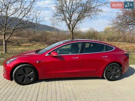 Красный Тесла Модель 3, объемом двигателя 0 л и пробегом 199 тыс. км за 17000 $, фото 1 на Automoto.ua